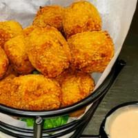 Boudin Balls · Our Louisiana seasoned mixture of pork, Cajun spices and rice served with remoulade sauce.