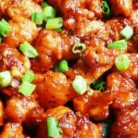 Gobi Manchurian · Fried cauliflower tossed in specially made spicy Manchurian sauce. Its made of soy sauce, ch...