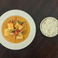 Panang Curry With Tofu · Coconut milk, bell pepper, carrot, and basil. Rice.