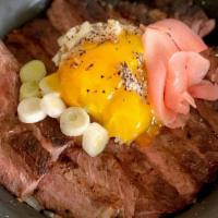 Steak Rice Bowl Combo烤牛排饭 · comes with miso soup and sesame balls