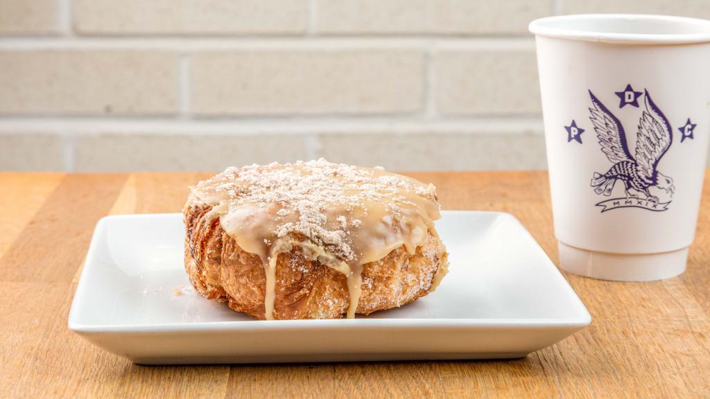 French Toast · Maple glaze, topped with cinnamon powdered sugar and maple syrup drizzle.