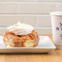 Coconut Cream Filled · Filled with coconut cream, topped with whip cream and toasted coconut.