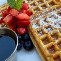 Waffles · Gluten free waffles with the choice of blueberry, strawberry, banana, or chocolate chips ser...