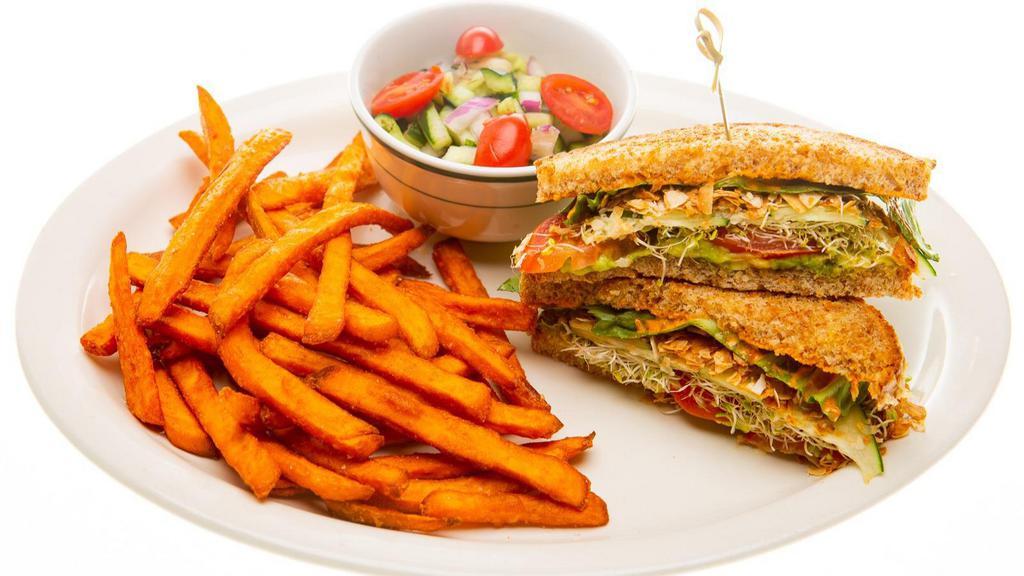 Avocado Blt Stacker · Include a side of fries and a tivoli salad. Avocado, coconut bacon, lettuce, tomato, cucumber, sprouts. Drizzled with paprika aioli served on multi-grain bread.