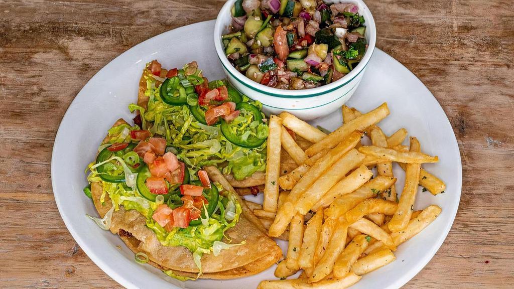 Mushroom Taco · Include a side of fries and a tivoli salad. House made mushroom patty with cabbage shreds, tomato, cilantro, jalapeno, onion, vegan mayo and drizzled with balsamic & tapatio.
