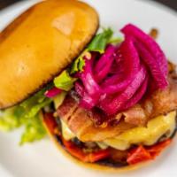 Macho-Macho Burger · Bacon, Tillamook sharp white Cheddar, mama Lil's peppers, romaine lettuce, pickled onions an...