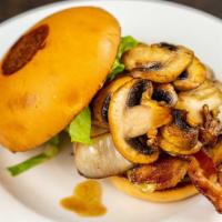 Mushroom Bacon & Swiss · Bacon, grilled onions and mushrooms, romaine lettuce, Swiss cheese, and special sauce.