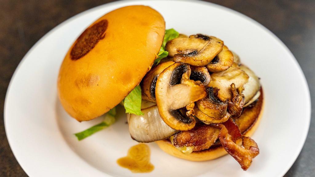 Mushroom Bacon & Swiss · Bacon, grilled onions and mushrooms, romaine lettuce, Swiss cheese, and special sauce.