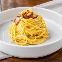 Spaghetti Carbonara  · Pancetta, eggs, cream sauce, black pepper, parmesan.