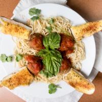 Spaghetti Meatballs · Served with fresh garden salad and garlic bread.