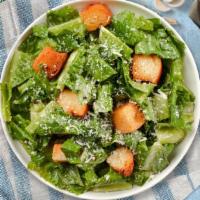 Caesar Salad · Romaine lettuce, croutons, lemon, and parmesan tossed with caesar dressing.