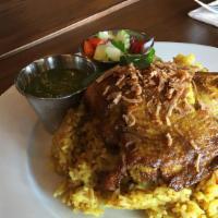 Chicken Biryani · Marinated chicken in Thai herbs, bay leaves and tumeric, onion chips, house special sauce
