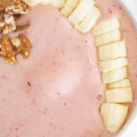 Strawberry Fields · Strwaberries, bananas, almond milk, grapes topped with chia seeds and shredded coconut.