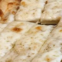Garlic Sticks · House-made flatbread covered with garlic oil and Mozzerella. Cut into strips and served with...