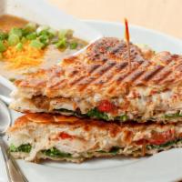 Spicy Turkey Panini · Hot. Turkey, provolone, caramelized onion, fresh spinach, roasted red peppers, spicy Parmesa...