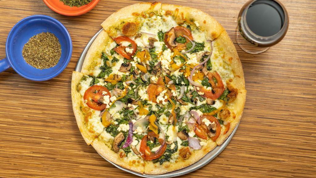 Vegetarian Pizza · 12 inch hand tossed crust, pesto sauce, mozzarella cheese, spinach, roma tomatoes, mushrooms, red onions, roasted yellow bell peppers topped with feta cheese.