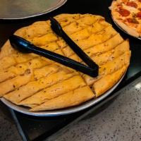 Breadsticks · Thick hand tossed pizza dough slathered with a garlic butter, topped with grated parmesan ch...