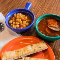 Soup By The Pint · Choice of our homemade Vegetarian Posole or Roasted Tomato Basil