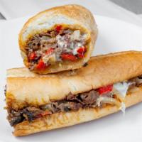 Philly Cheese Steak Sandwich · Most popular. Philly cheese steak sandwich thinly sliced top choice beef or chicken with oni...
