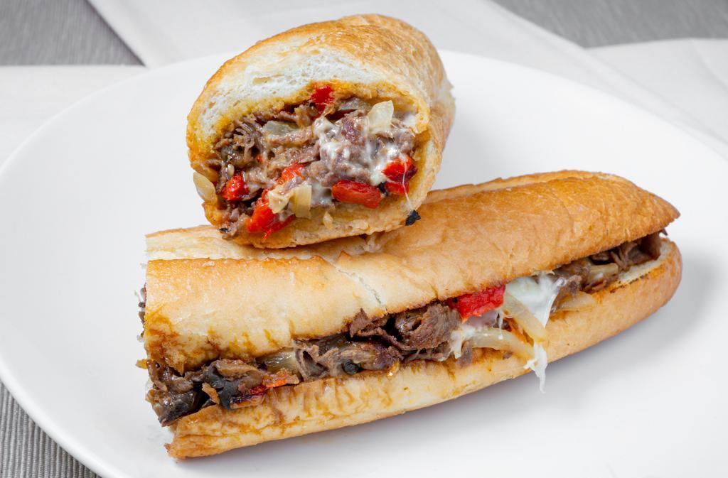 Philly Cheese Steak Sandwich · Most popular. Philly cheese steak sandwich thinly sliced top choice beef or chicken with onions, your choice of provolone or white American cheese with mushrooms or roasted sweet peppers.
