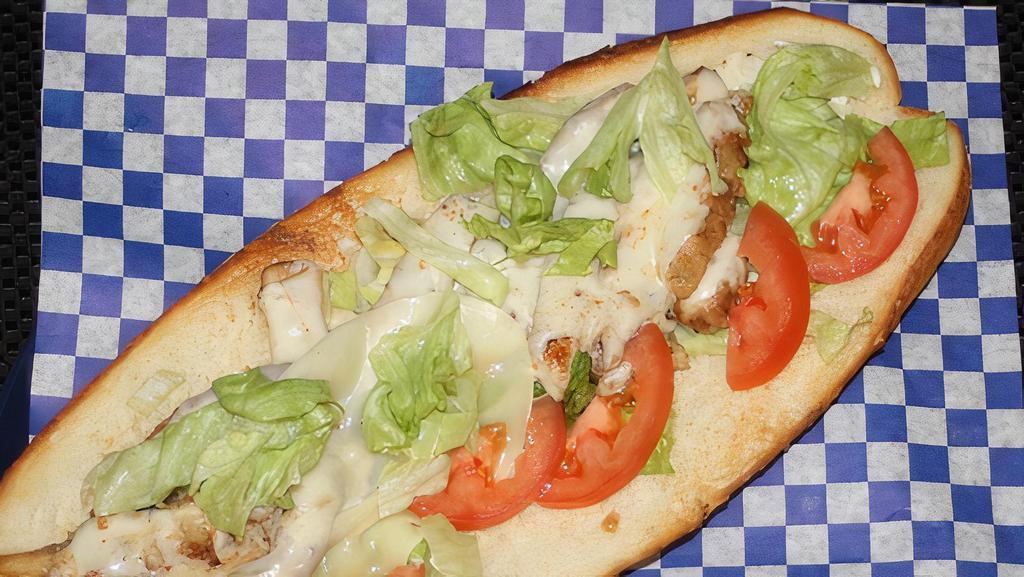 Grilled Chicken Sandwich · Chicken breast, with melted mozzarella cheese, mayo, lettuce, tomatoes, grilled onions, and  grilled green peppers