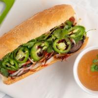 Pho Beef Dip · Pho Beef Dip comes with roast beef, hoisin sauce, sriracha, onions, jalapenos and cilantro. ...