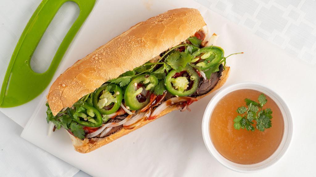 Pho Beef Dip · Pho Beef Dip comes with roast beef, hoisin sauce, sriracha, onions, jalapenos and cilantro. Also comes with a side of homemade pho broth for dipping!