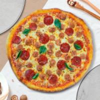 Vegan Sausage Space & Pepperoni Pizza · Generous amounts of vegan sausage, vegan pepperoni, vegan mozzarella, vegan marinara, choppe...