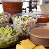 Fresh Tableside Guacamole · Vegetarian. Prepared just the way you like it! Fresh avocado, red peppers flakes, tomatoes, ...