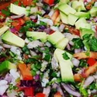 Ceviche · Raw diced black tiger prawns or tilapia fish, onions, tomatoes, cucumbers and cilantro cooke...