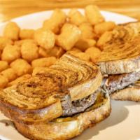 Classic Patty Melt · Toasted rye bread, seasoned American Wagyu steak patty, salty and slightly sweet onions, mel...