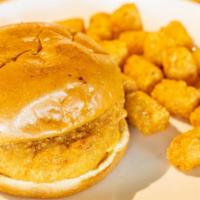 Chicken Sandwich · Seasoned fried chicken breast on a toasted brioche bun, pickles, and house secret sauce. Ser...