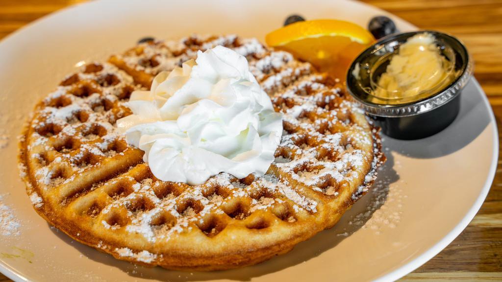 Bubble Waffle · Bubble waffle topped with whipped cream and powdered sugar. Add fruits on top for an additional charge.