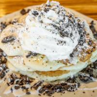 Oreo Pancakes · (3) crushed Oreos in pancake batter, topped with housemade Oreo cream, whipped cream, Oreo, ...