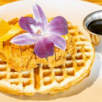 Chicken & Waffles · Bubble waffle served with 2 crispy fried chicken drumsticks. Add potatoes/tater tots for an ...
