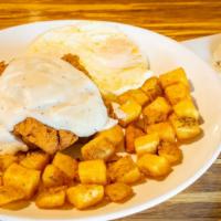 Chicken Fried Steak · Country fried steak smothered in warm house made gravy. Served with potatoes and (2) eggs.