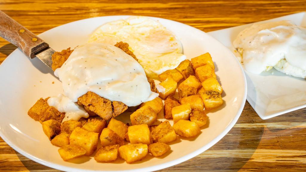 Chicken Fried Steak · Country fried steak smothered in warm house made gravy. Served with potatoes and (2) eggs.