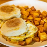101 Breakfast Muffins · Toasted muffins, over hard eggs, Sausage, cheddar cheese, made into a Sandwich. Served with ...