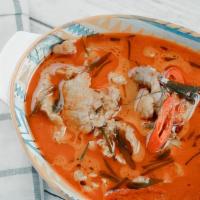 Panang Curry Chicken (R2) · Favorite. Gluten free. Medium spiced red curry, sweet potatoes, carrots, Thai basil and blac...