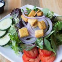 Classic House Salad · Mixed greens, tomatoes, red onions, cucumbers, croutons. Your choice of dressing.