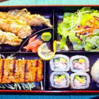 Salmon · Salmon, CA rolls (four pieces) and prawn tempura (three pieces).