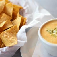 Chips & Queso · House made queso. Best in the city.