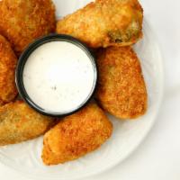 Jalapeño Poppers · Jalapenos filled with cream cheese.