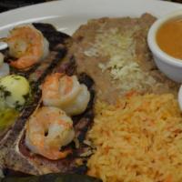 T-Bone Jalisco · New. A deliciously seasoned t-bone steak and grilled shrimp. Served with red or green chile,...