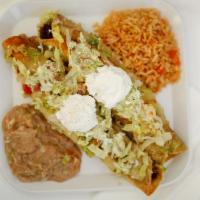 Flautas (2) · Choice of ground beef, shredded beef or chicken with beans and rice. Topped with Mexican or ...