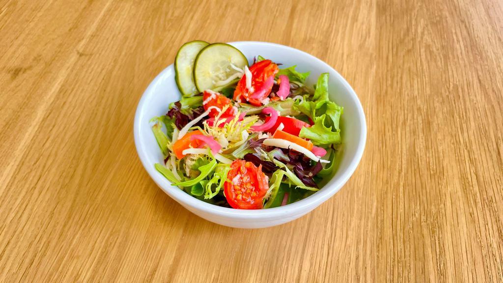 Mixed Green Salad · mixed greens, tomatoes, cucumbers, pickled carrots, pickled red onions,
mozzarella, bread crumbs with choice of dressing.