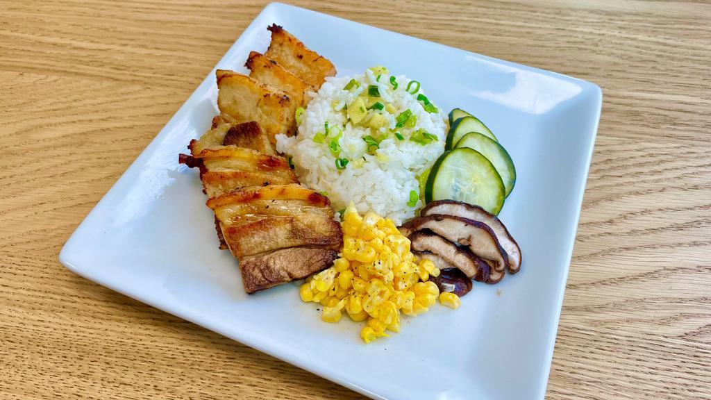 Roasted Pork Belly · oven roasted confit pork belly, white rice with ginger scallion sauce, pickled cucumber, pan seared mushrooms, fresh sweet corn
(gluten free)