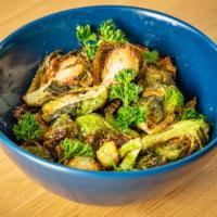 Brussels Sprouts · fried and tossed with ginger scallion sauce.
(gluten free)