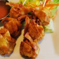 Fried Dumpling (6Pc) · Deep fried chicken and shrimp wonton with sweet chili sauce.