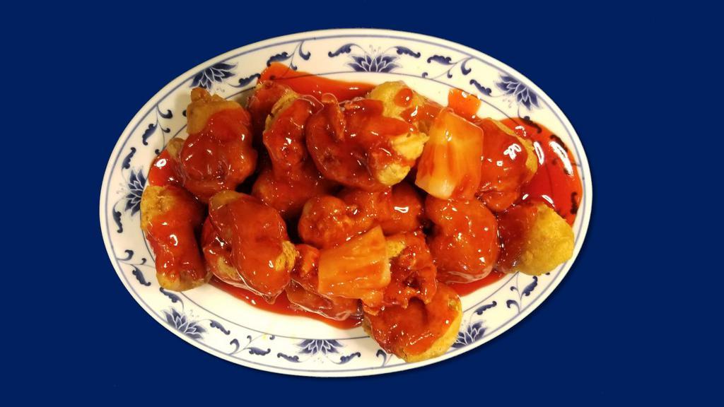 Sweet & Sour Chicken · Deep fried chicken golden brown service topping sweet and sour sauce.